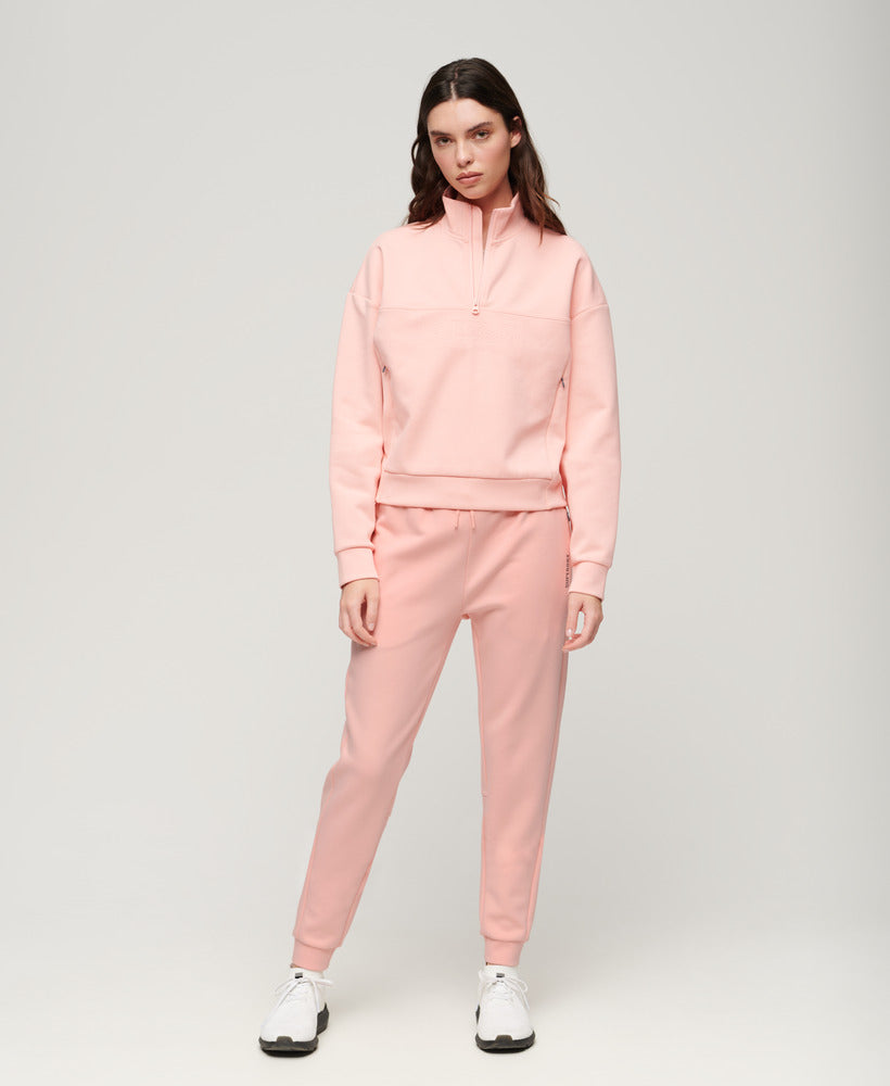 Sports Tech Slim Joggers | Peach Pearl Pink